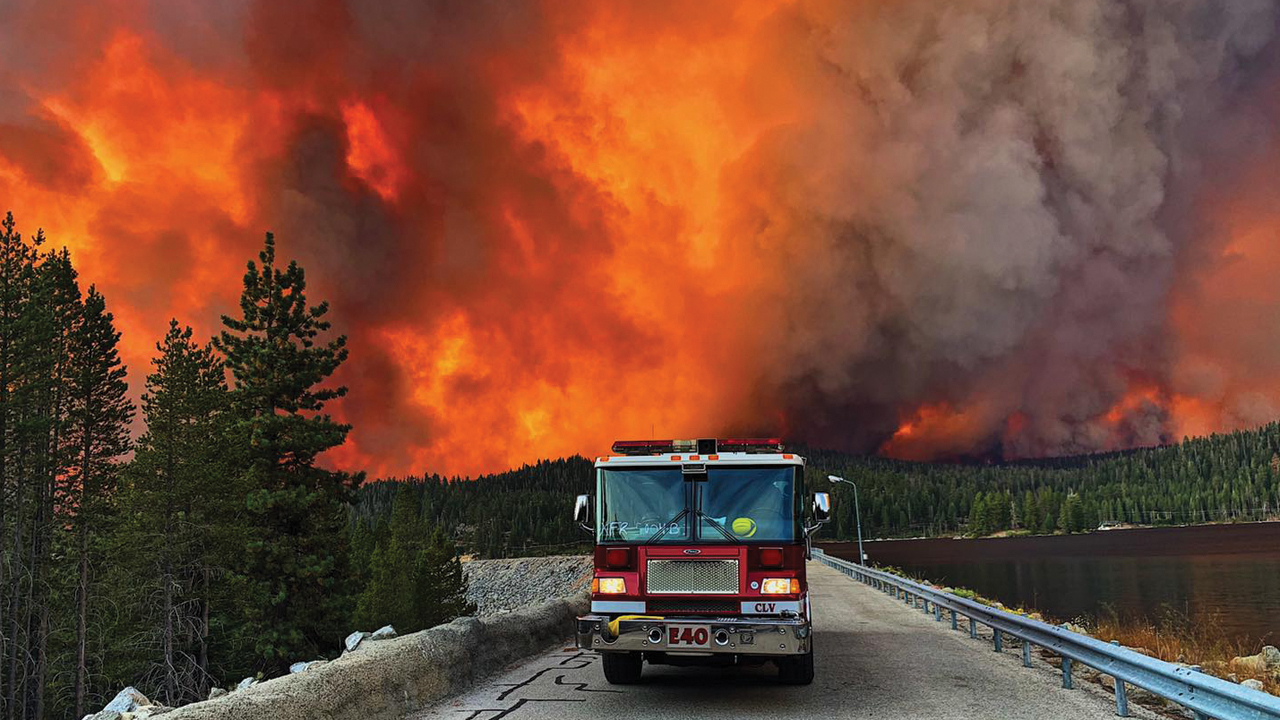 A Clovis Fire Department engine sits on the Huntington Lake dam while working to control the Creek Fire in California the weekend of Sept. 6. Camp Keola sits on the edge of the lake. — Clovis Fire Department