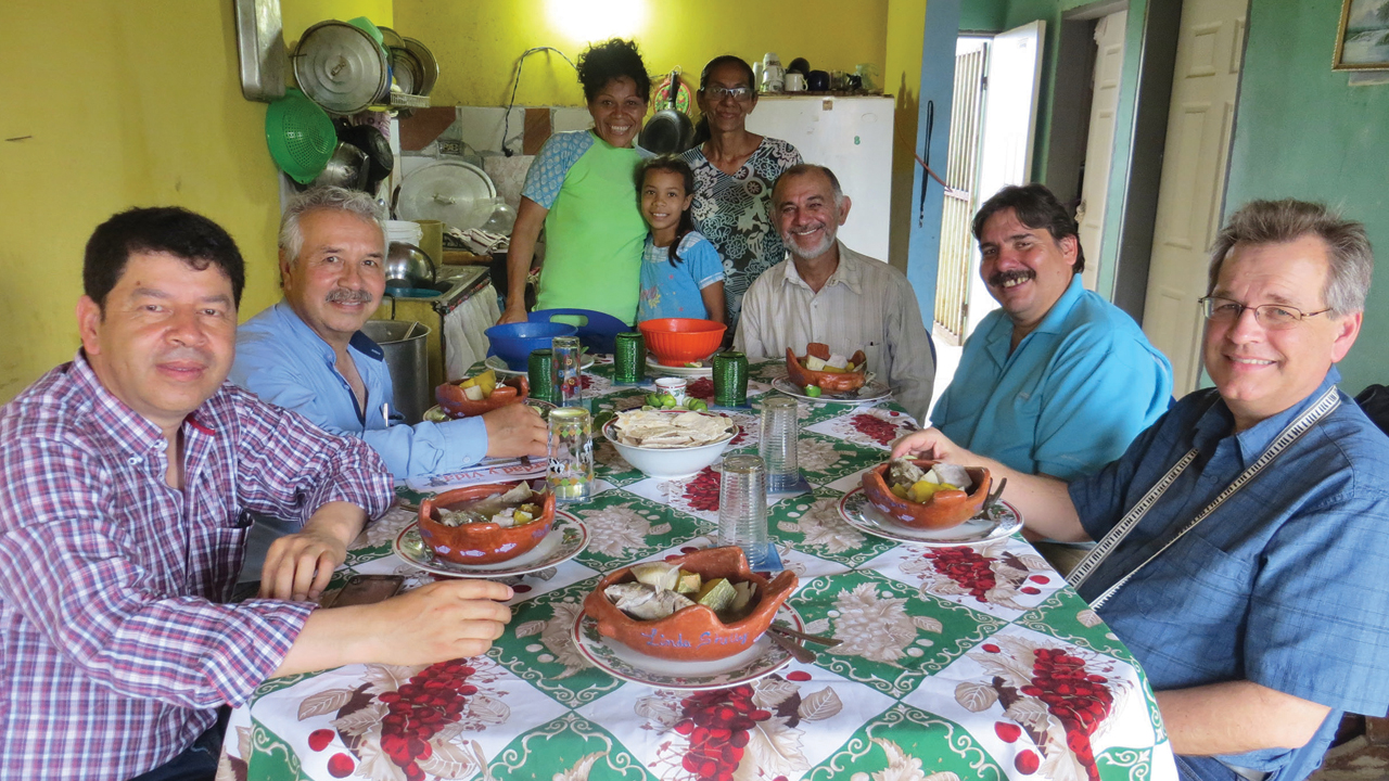 Erwin Mirabal, second on the right, hosts a partnership visit in 2018 in Venezuela along with Yermanda Acosta, Verdany Acosta, Darlenis Estaba de Bauza and Euclides Bauza from the Comunidad de Paz church on Isla Margarita. Visitors include Oscar Herrera and Carlos Moreno from the missions committee of the Colombia Mennonite Church, left, and David Boshart from Central Plains Mennonite Conference, right. — Linda Shelly