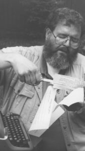 Wally Kroeker undertakes the editor’s most important task, cutting out the best part, in 1994. — Wally Kroeker