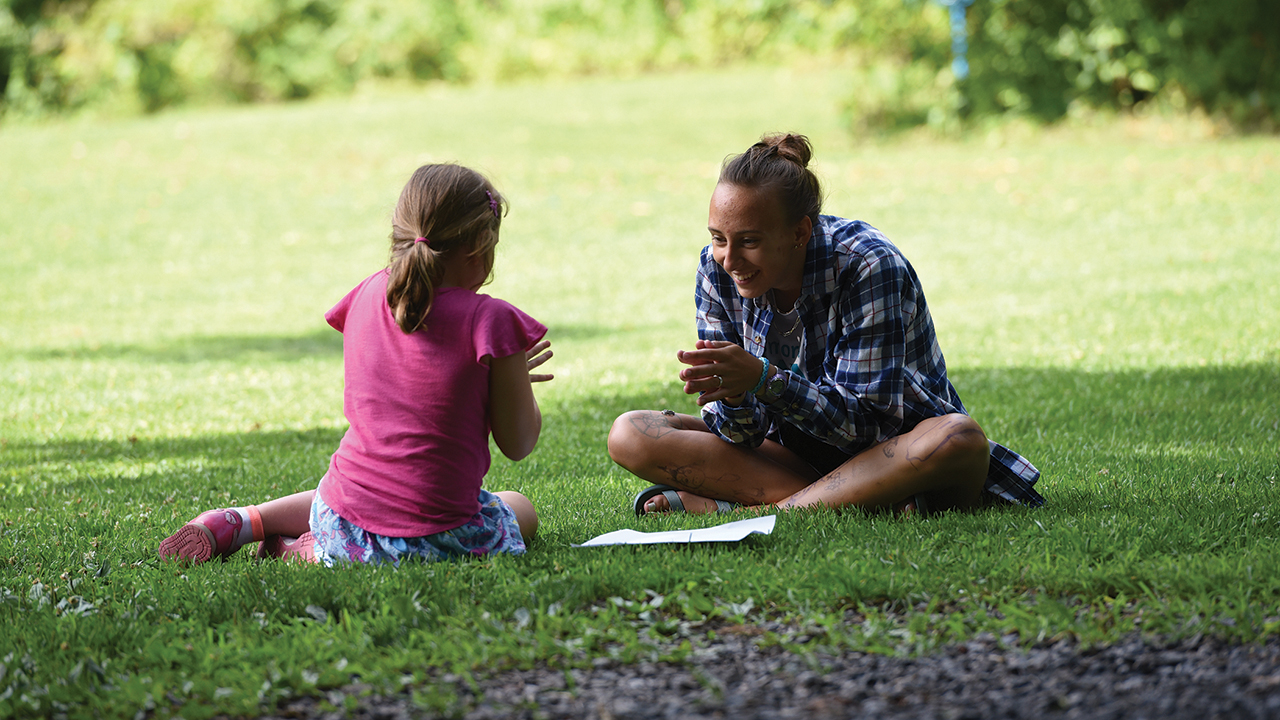 Hope Martin, right, with a camper at Woodcrest Retreat, Ephrata, Pa. — Eliza Taylor