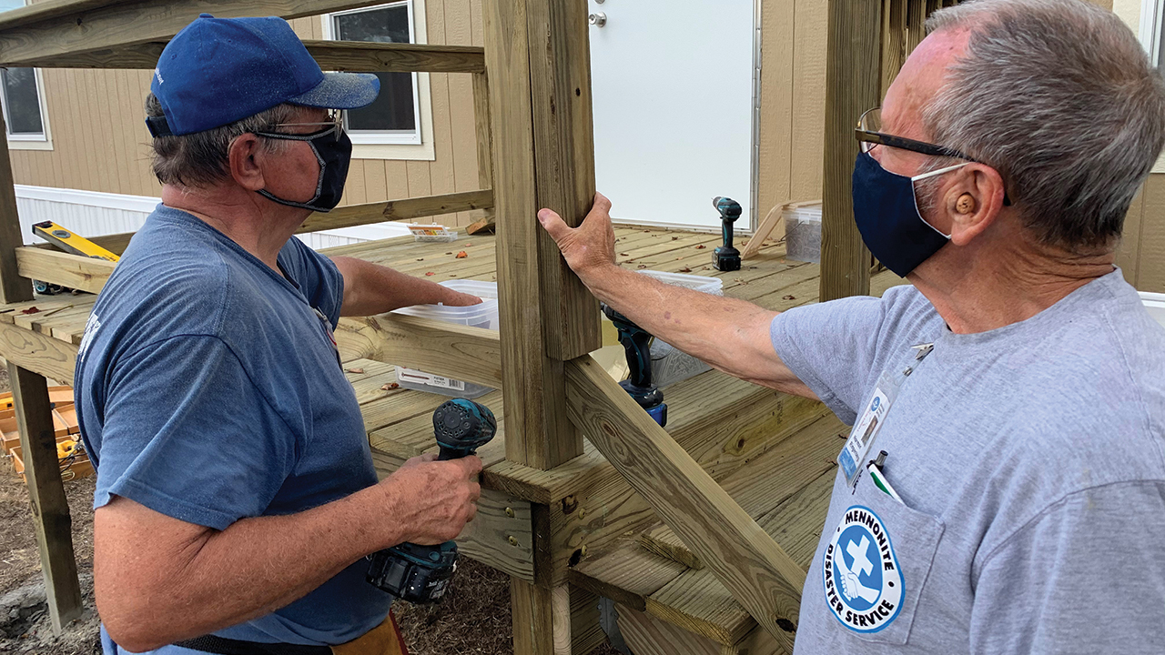 Mennonite Disaster Service recreational vehicle volunteers Bob Ratzlaff and Norm Ringenberg build a deck Nov. 11 for a home in Aransas Pass, Texas. — Mennonite Disaster Service