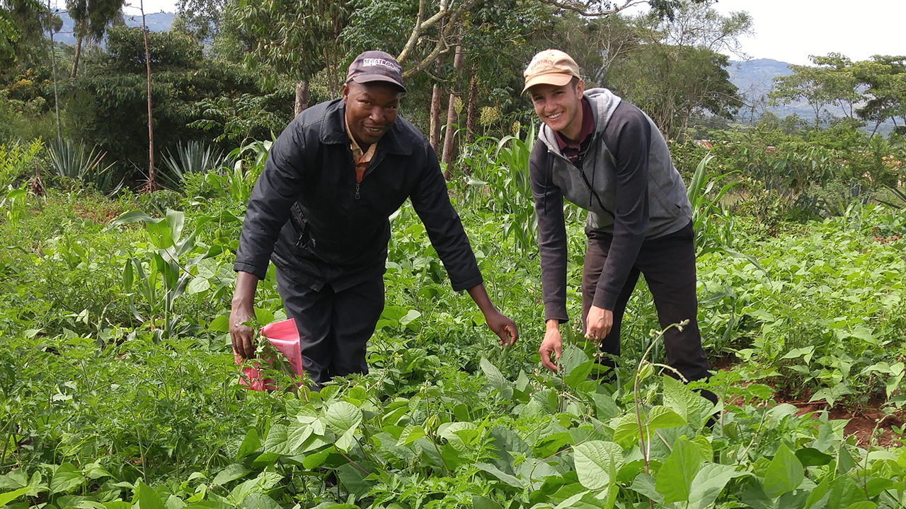 Ben Brockmueller, right, served in Kenya with Mennonite Central Committee’s SALT (Serving and Learning Together) program in 2017-2018. At left is Joel Mutua, one of the lead farmers and agricultural educators in his Kenyan community. — Arnold Mwatha Maingi