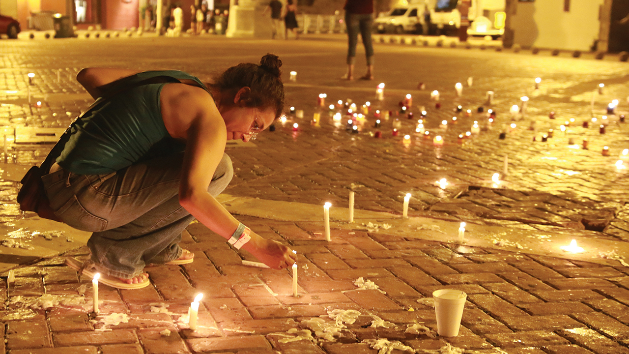 Candles mark the hope many Colombians had when a peace accord was signed in 2016. — Presidencia El Salvador/Creative Commons