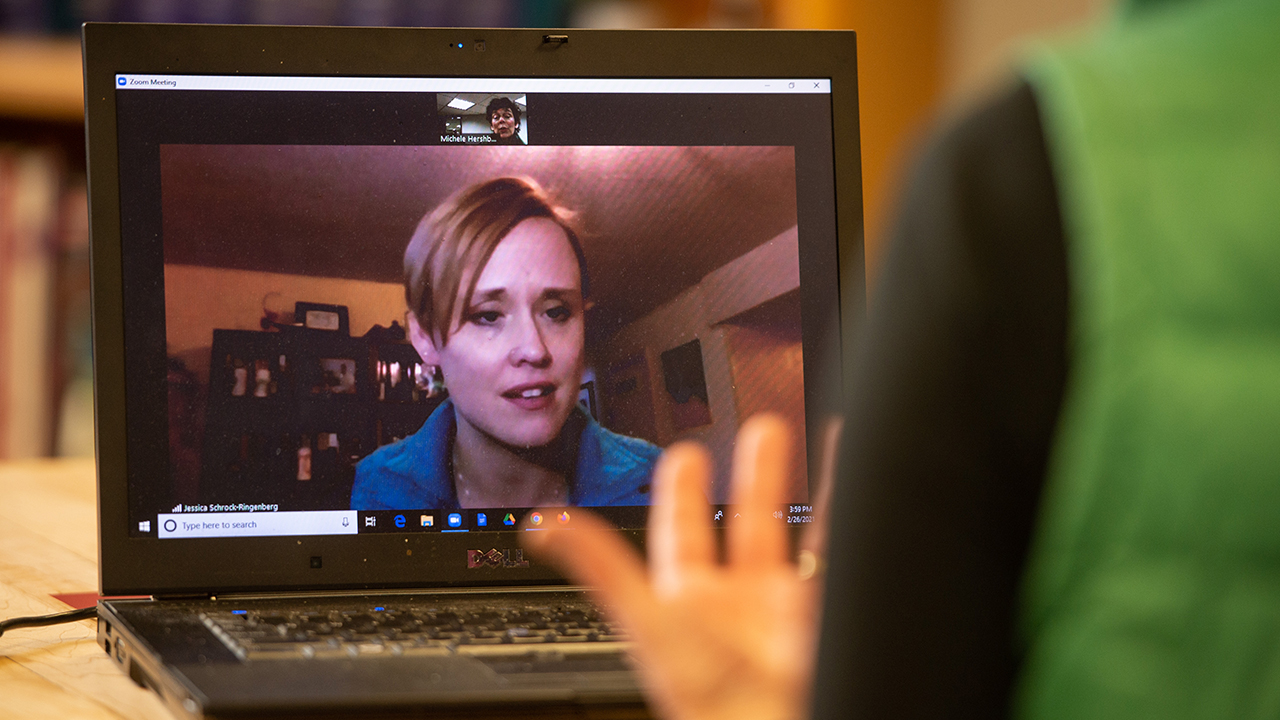 Jessica Schrock-Ringenberg, on screen, director of the Hesston College CALL program, talks with Hesston professor Michele Hershberger. — Larry Bartel/Hesston College