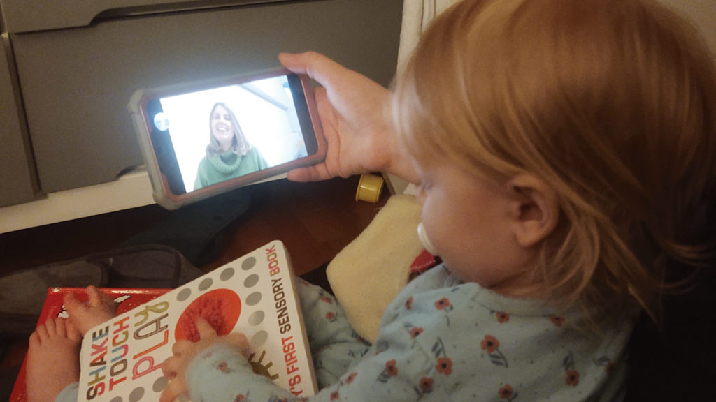 Nora Schwarz, daughter of Rainbow members Leah and Gregory Schwarz, watches Pastor Ruth Harder preach. — Gregory Schwarz