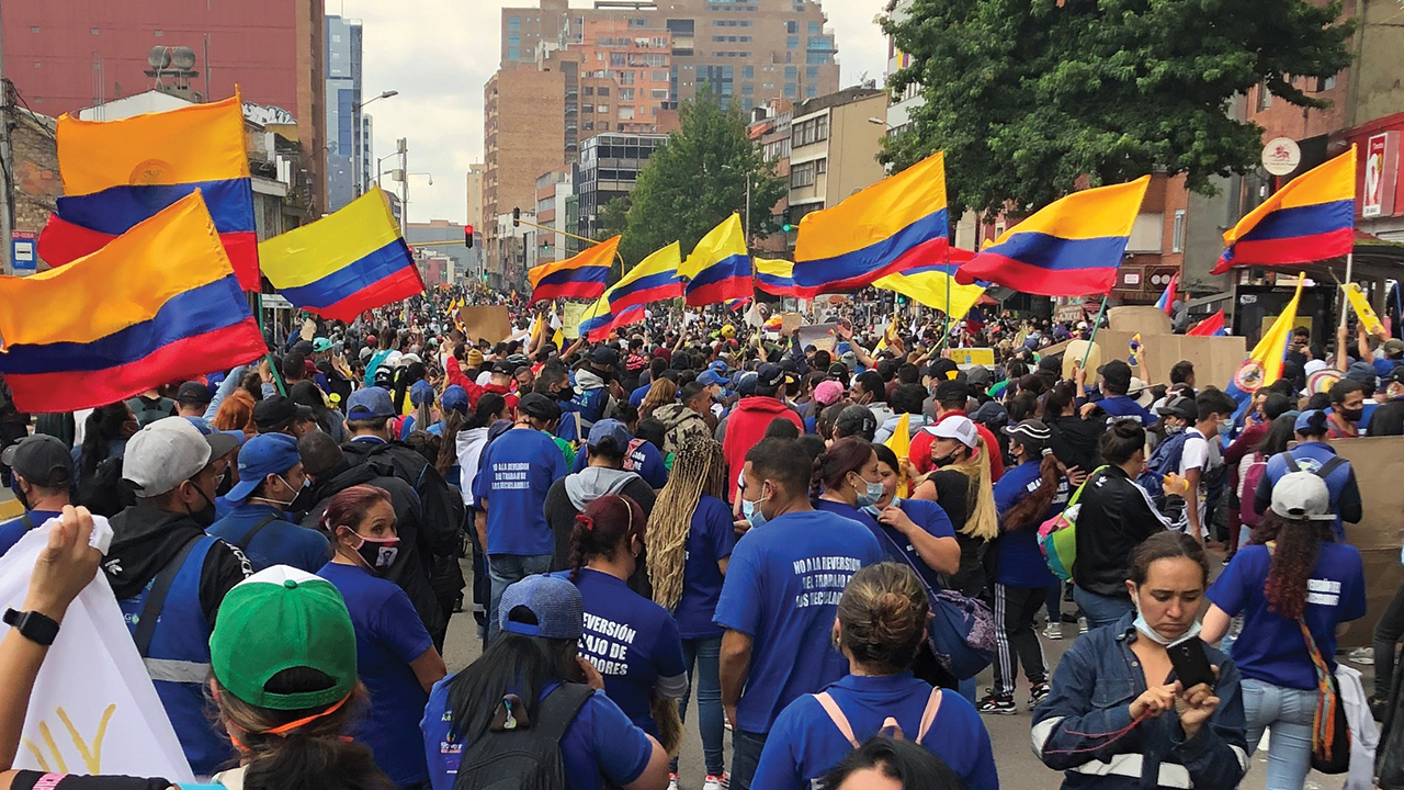 Representatives of JustaPaz — among other citizens, human rights workers and labor union members — join demonstrations in Bogotá, Colombia. — Rebekah York/MMN