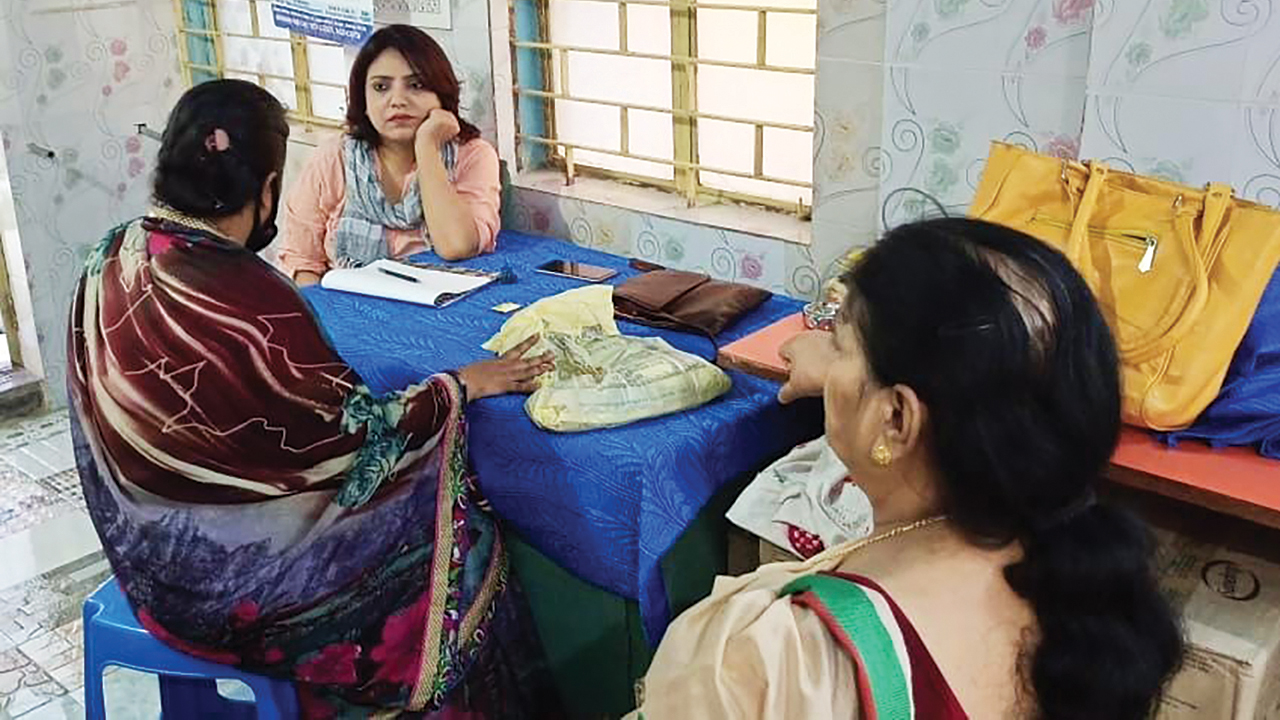 (Below) Counselor Mily Chatterjee, facing camera, listens to Anju Shaw, left, during a counseling session through MCC partner Barrackpore Avenue Women’s Cultural & Social Welfare Society. — Barrackpore Avenue