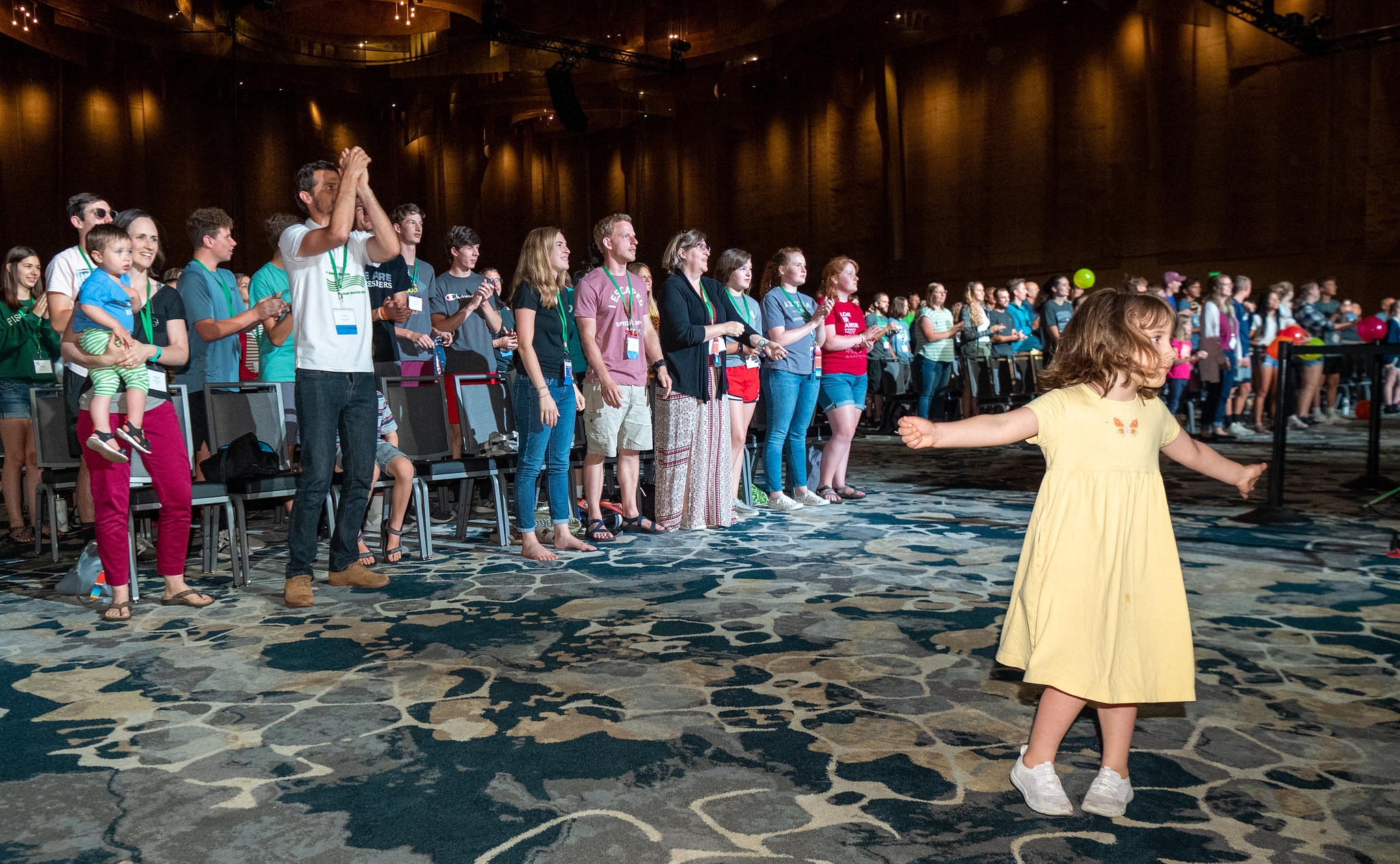 A girl dances to the music of the worship band in Duke Energy Convention Center. — Ken Krehbiel/MC USA