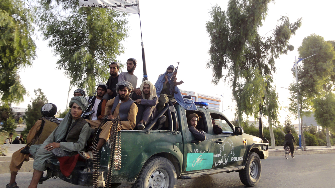 Taliban fighters patrol in Kandahar, Afghanistan, on Aug. 15. — Sidiqullah Khan/AP