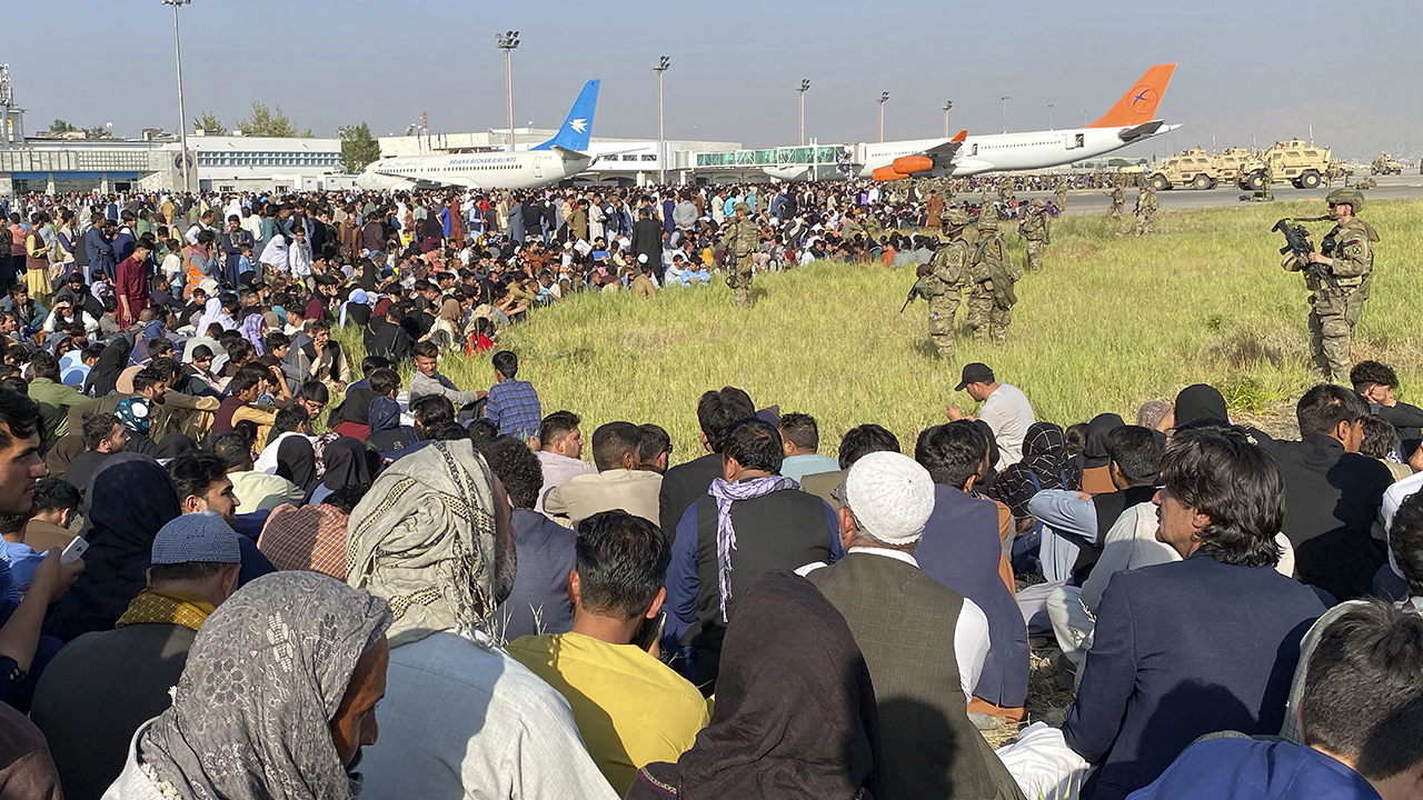 U.S. soldiers stand guard along the perimeter at the international airport in Kabul, Afghanistan, on Aug. 16. — Shekib Rahmani/AP