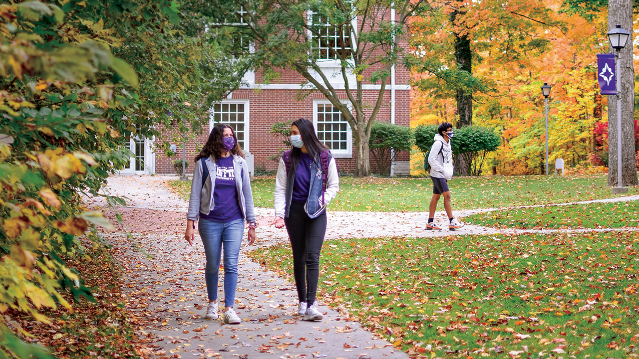 Roommates Leslie Diaz Valdiviezo of Bluffton, Ohio, and Luisa Rivera of Yoro, Honduras, wore face masks as they left Mussleman Library in fall 2020. The use of face coverings is part of the university’s #ProtectTheDam plan. — Claire Clay/Bluffton University