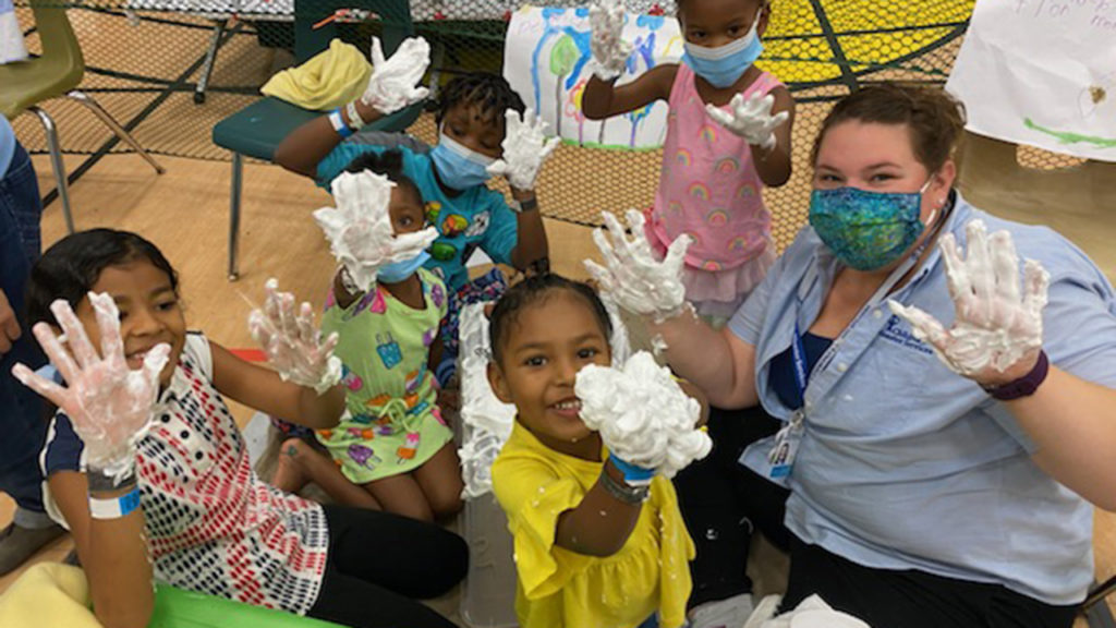 CDS project manager Crystal Baker does an art project with children in September as part of a response to Hurricane Ida in Louisiana. — Children’s Disaster Services
