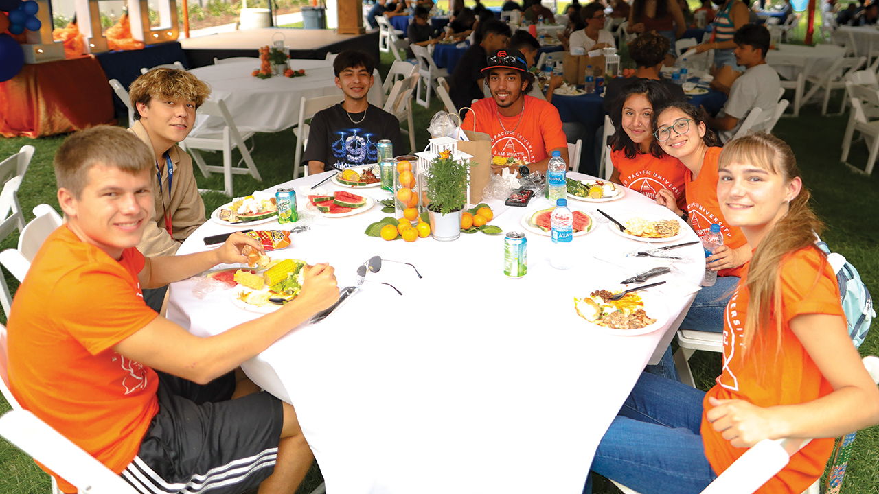 New students enjoy a barbecue during orientation activities on the main Fresno Pacific University campus Aug. 19. — Fresno Pacific University