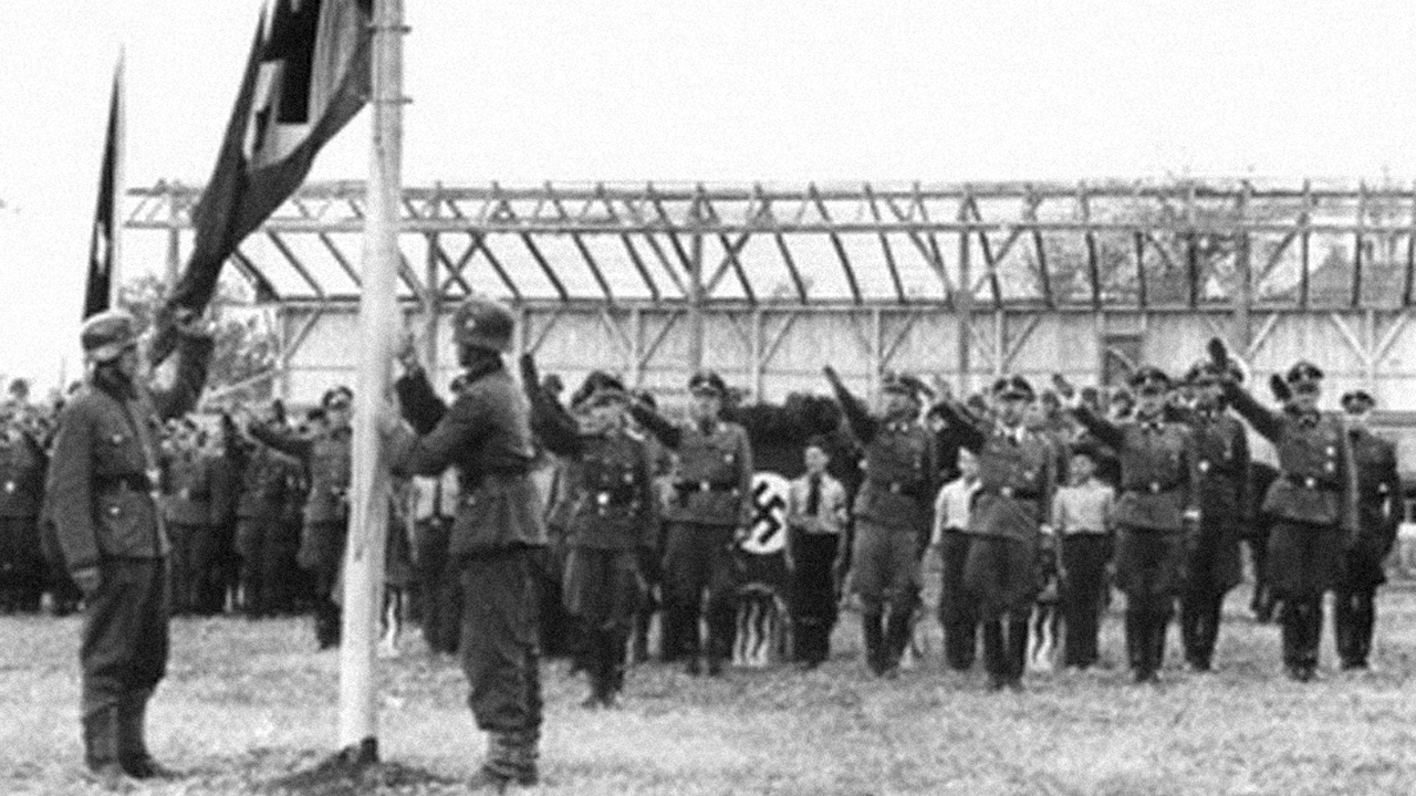 Heinrich Himmler, third from right, head of the SS, at a flag-raising ceremony in the Molotschna Mennonite colony in Nazi-occupied Ukraine, 1942. — Mennonite Library and Archives, North Newton, Kan.