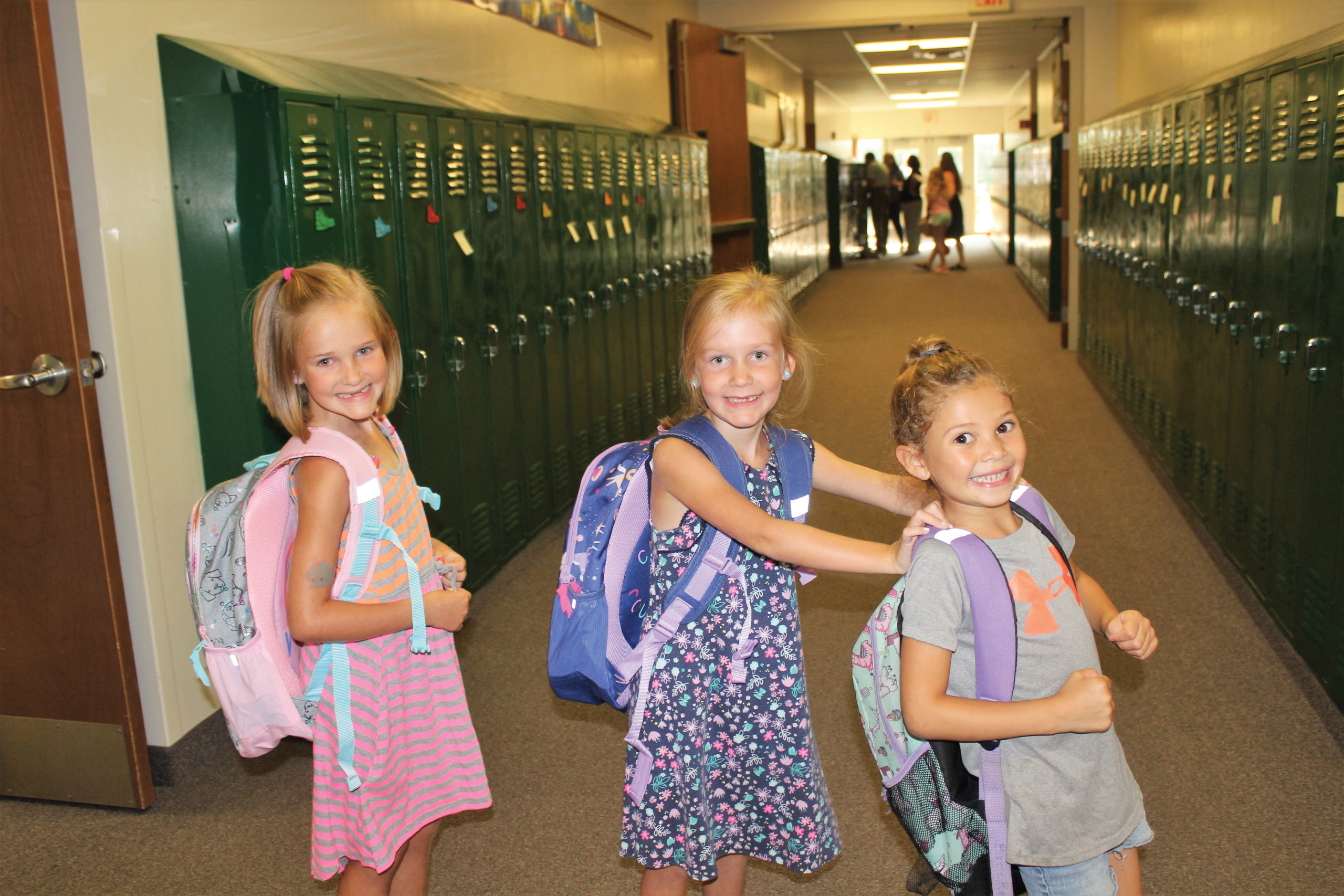 A new school year holds the promise of excitement for three Hunsberger sisters on Aug. 30 at Quakertown Christian School in Pennsylvania. — Erica Talese/Quakertown Christian School