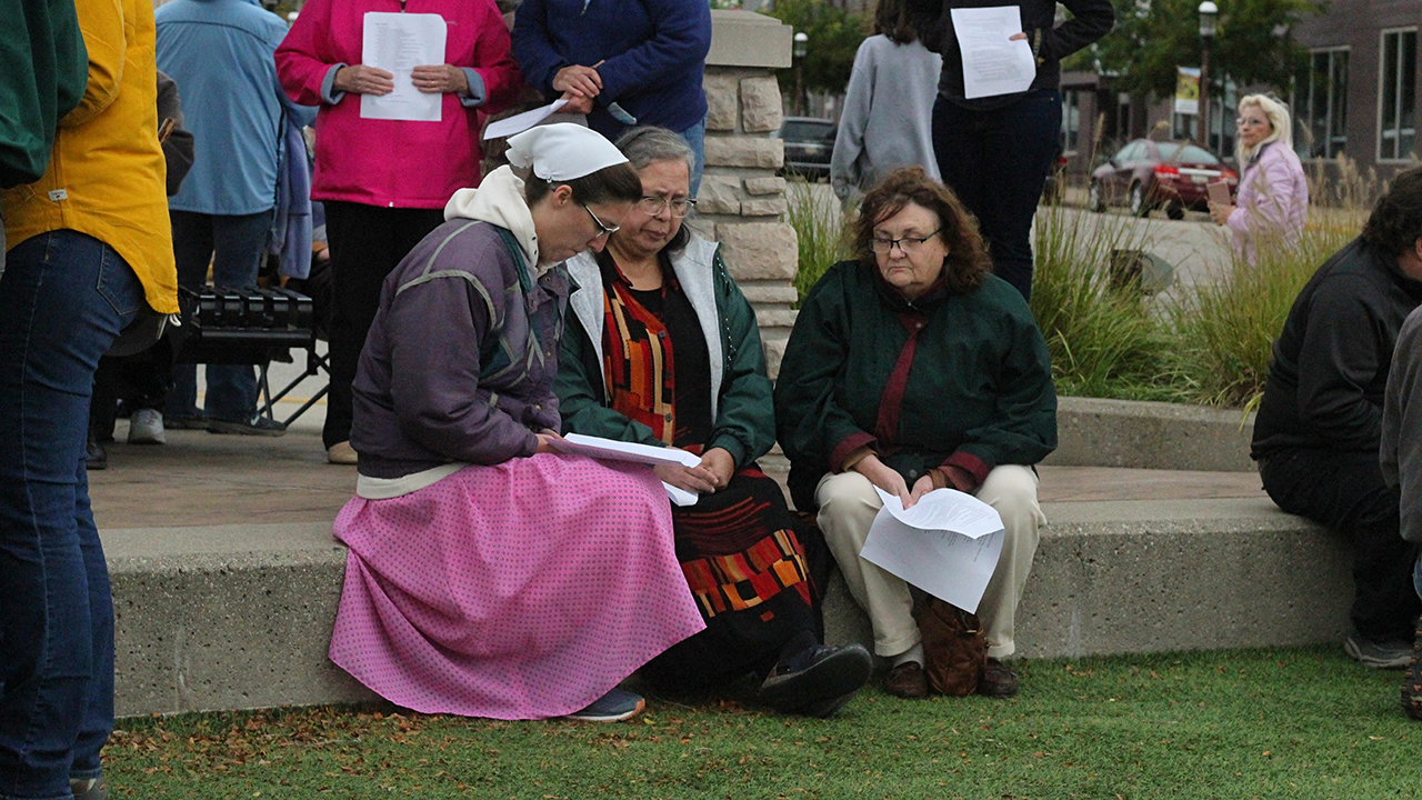 People gather Oct. 24 for a vigil in Hart, Mich., to pray for the return of 17 members of a Christian Aid Ministries group who were kidnapped by a gang in Haiti more than a week ago. Among those taken were four children and a parent from Hart. (Anna Liz Nichols/AP)