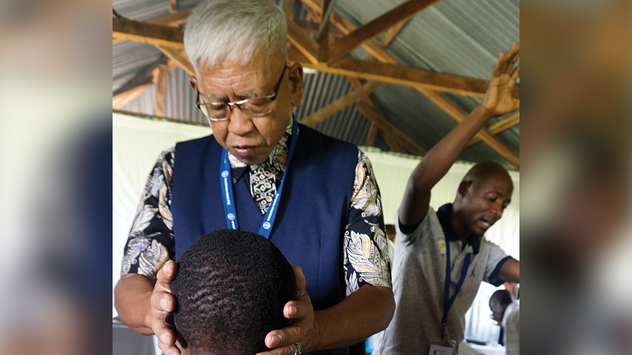 Ambrocio Porcincula prays in Kenya in 2018. — Ebenezer Mondez