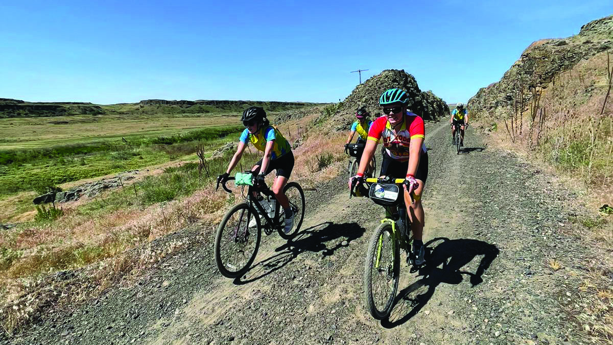MILES TO GO — Cyclists on the Center for Sustainable Climate Solutions climate ride set out on an early leg of their journey in Washington state.