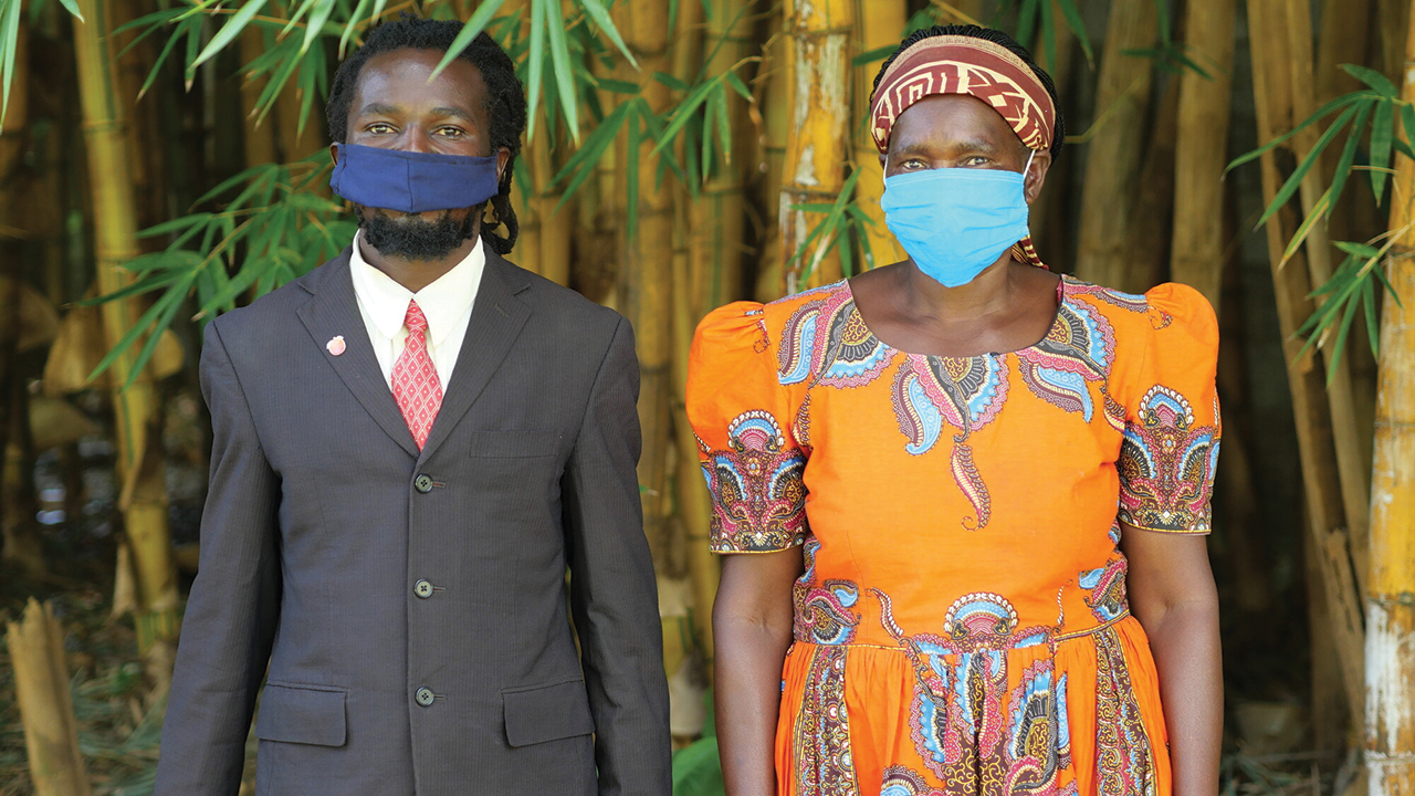 After participating in a peace club in prison, Zebron Mwale, left, reconciled with Mary Mweemba, who had reported him to police. Now they lead a peace club together in their community. — Amanda Talstra/MCC
