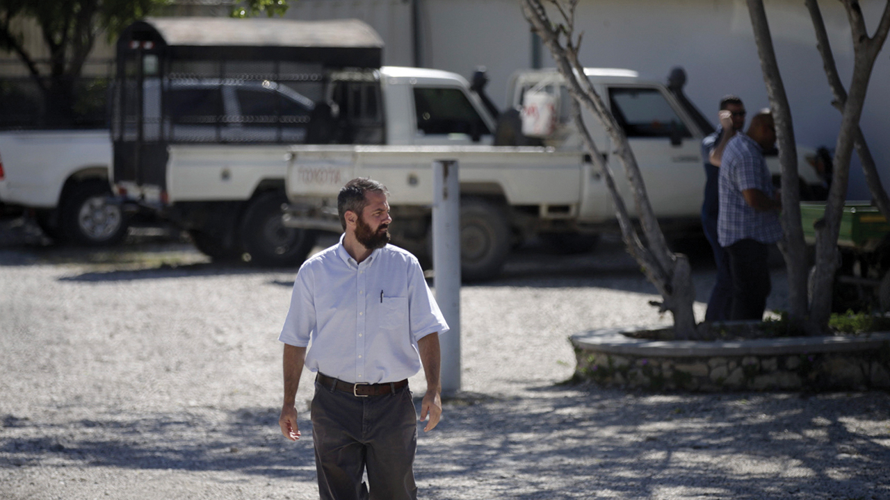 A person at the Christian Aid Ministries headquarters walks inside the center at Titanyen, north of Port-au-Prince, Haiti, on Dec. 6. — Odelyn Joseph/AP