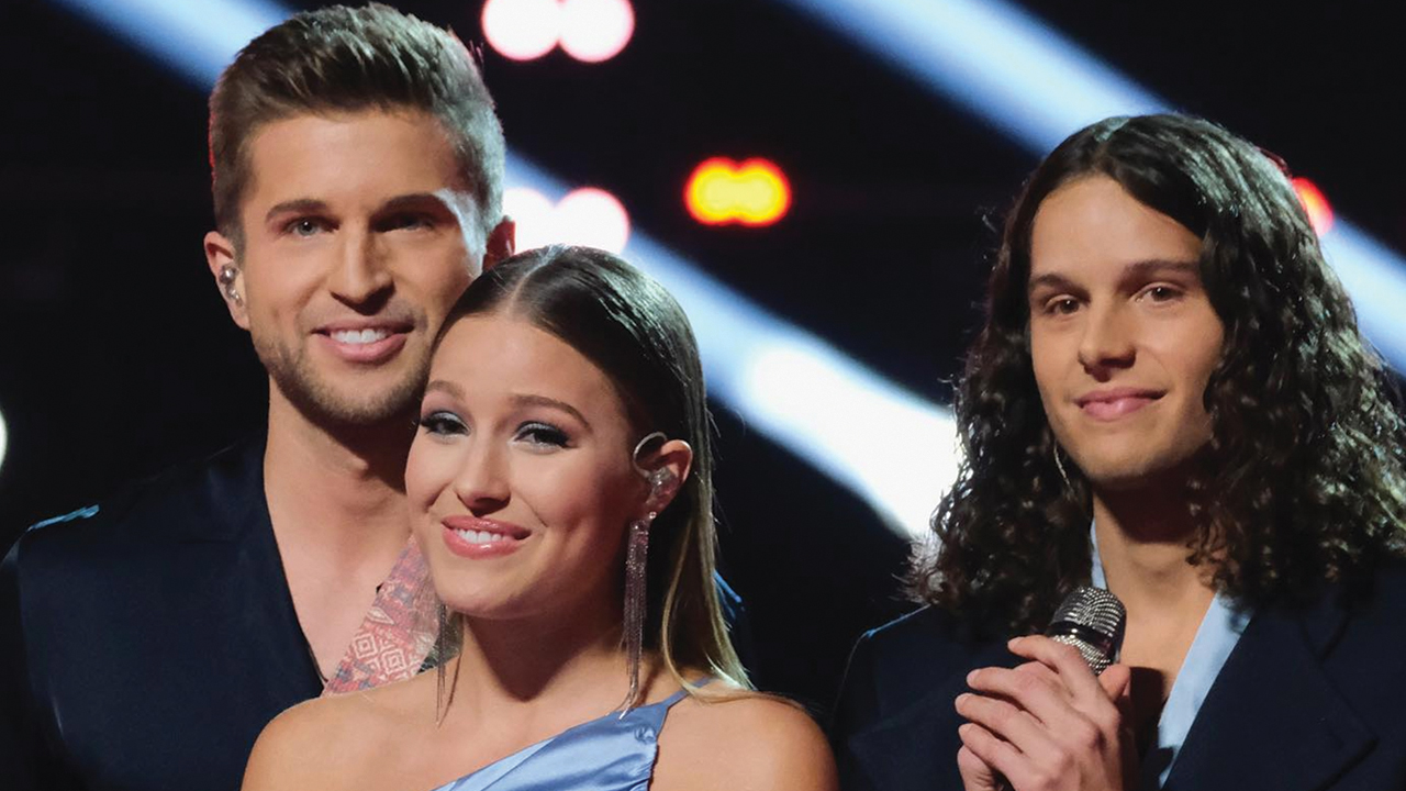 Girl Named Tom — siblings Caleb, Bekah and Joshua Liechty — receive feedback from celebrity coaches Nov. 23 on The Voice. — Girl Named Tom