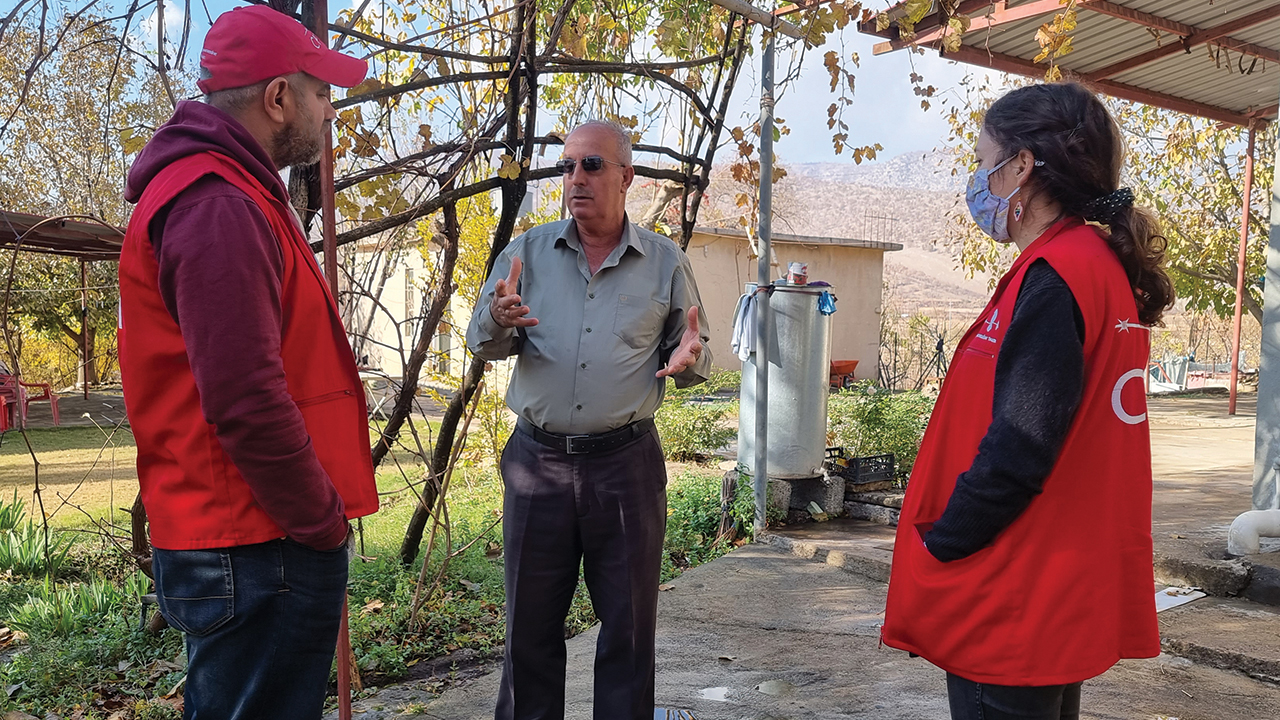 Mohammed Salah and Rebekah Dowling of Community Peacemaker Teams visit Kak Yousif on Dec. 2. Yousif’s village, Kashkawa, in Iraqi Kurdistan’s Nahla Valley, is surrounded by five military checkpoints. — Runak Hassani/CPT