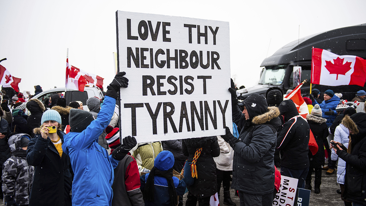 Protestors show their support for Freedom Convoy truck drivers on Jan. 27 in Vaughan, Ont. — Arthur Mola/AP