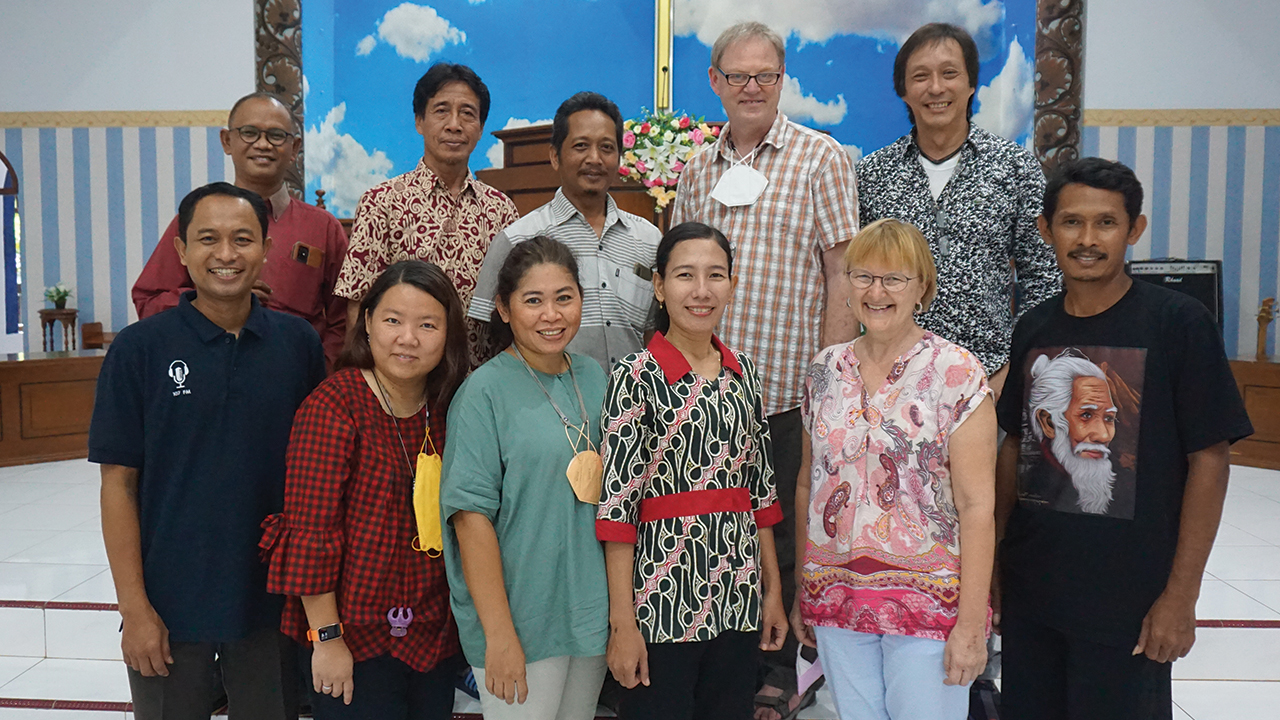 Mennonite World Conference and local church staff gathered in March at GITJ Margokerto. The church will be one of four satellite host venues for evening plenaries at MWC Assembly 17. Back row from left: assistant pastor Rano Surita, Mr. Hartana, Mr. Sudi Seswanto, Wilhelm Unger, Agus Setianto. Front row: assistant pastor Tri Almono, Sarah Yetty, Lydia Suyanto, Peni Widjayanti, Liesa Unger, Pastor Penta Kostafani. — Mennonite World Conference