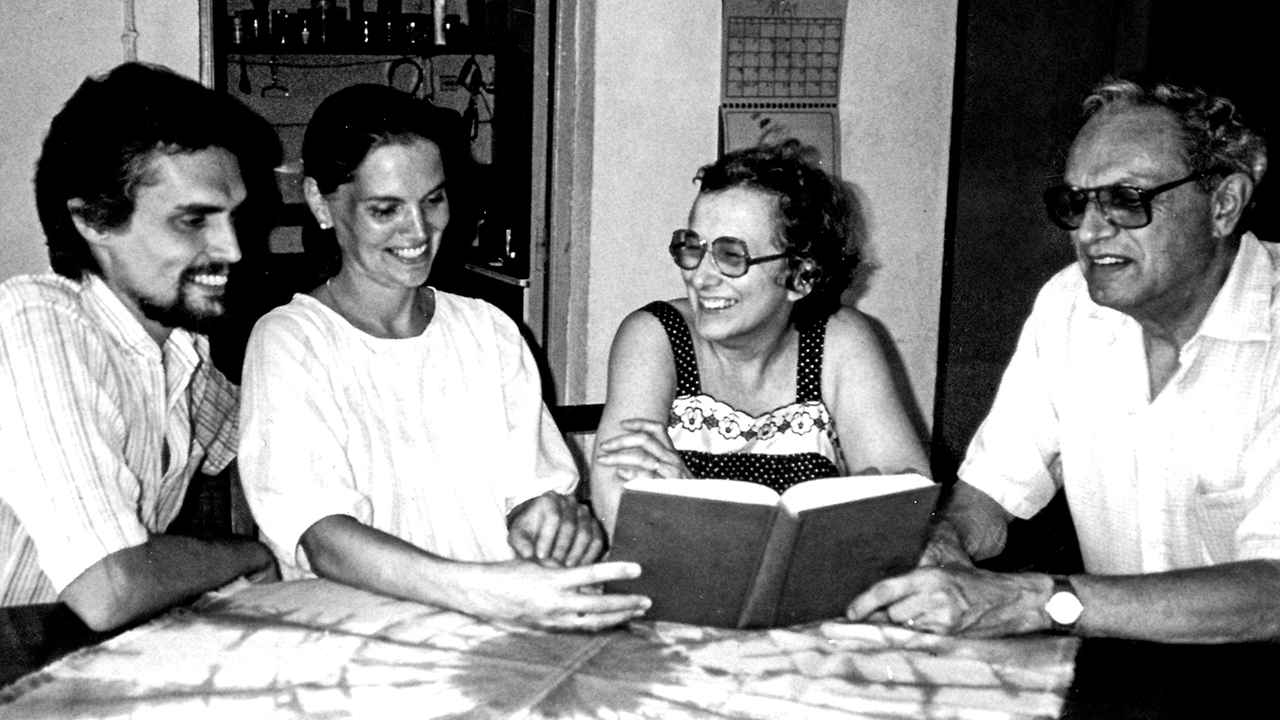 Wilma Shank, center, enjoys fellowship with James and Jeanette Krabill, left, co-workers in Ivory Coast, and husband, David, in 1986. — Marian Hostetler/Mennonite Church USA Archives