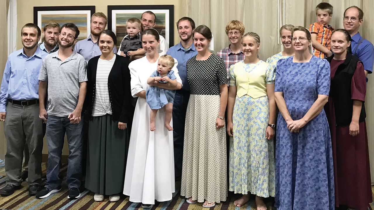 Christian Aid Ministries workers and family members who had been abducted reunited on Dec. 18 in Florida, along with the father (back right) of one of the kidnapped families. — Christian Aid Ministries