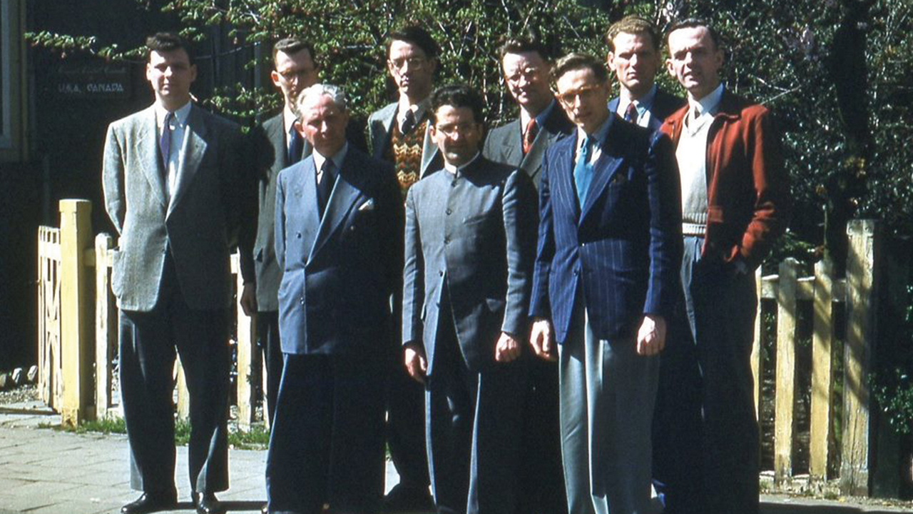The Concern group at Koningslaan, the Netherlands, in 1958. Front row, from left: Domine van der Zippe (Dutch pastor), Paul Peachey, David A. Shank. Back row: Orley Swartzentruber, John W. Miller, John Howard Yoder, Arnold Regier, Calvin Redekop, Irvin B. Horst. — Mennonite Church USA Archives