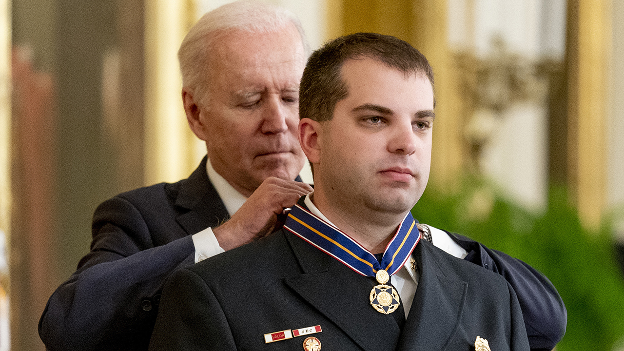 East Wayne Fire District assistant chief Ryan Sprunger receives the Medal of Valor from President Joe Biden May 16 at the White House. — Andrew Harnik/AP