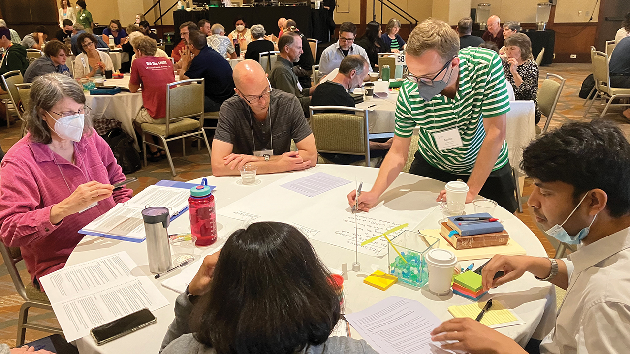 Delegates work during the special session of the Mennonite Church USA delegate assembly May 27-30 in Kansas City, Mo. — Paul Schrag/AW