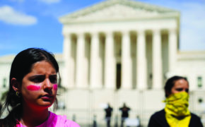 Demonstrators protest outside of the U.S. Supreme Court on June 28. — Mariam Zuhaib/AP