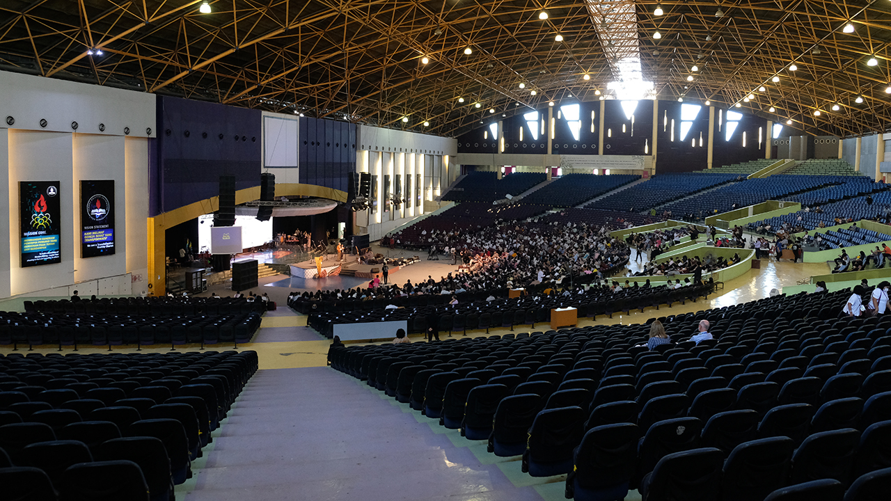 Mennonite World Conference assembly participants attend the final worship service July 10 at the 12,000 seat sanctuary of JKI Injil Kerajaan, a Mennonite church known as the "Holy Stadium," in Semarang, Indonesia. — Kresna Kurniawan for Meetinghouse