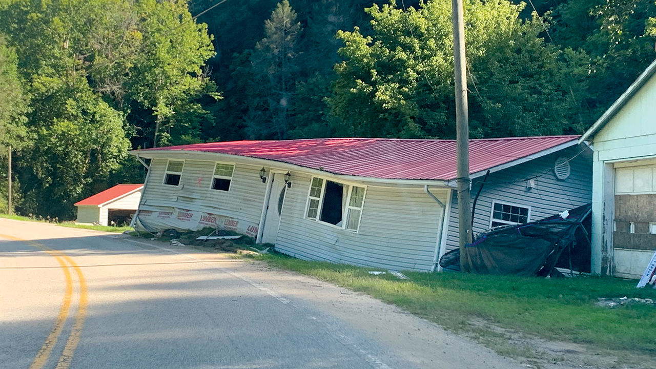 Many homes in eastern Kentucky were twisted and turned when flash flooding hit their foundations. — Larry Stoner/MDS