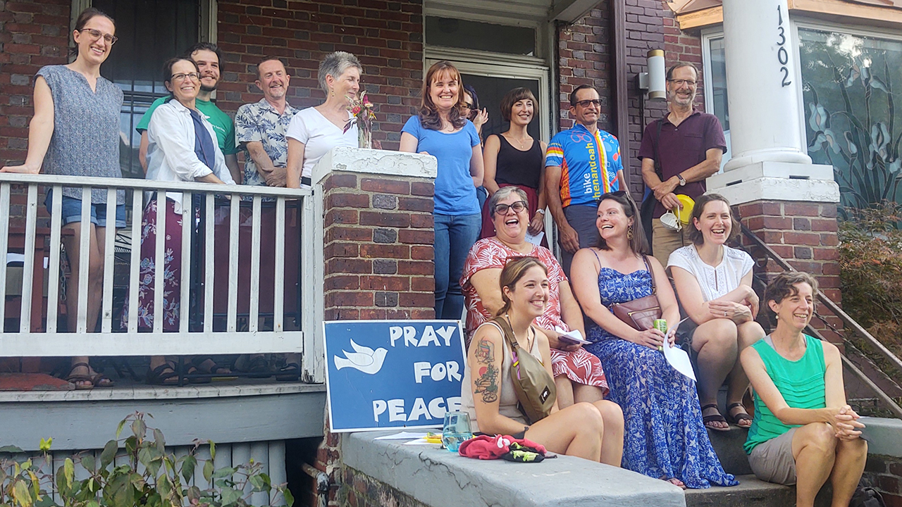 ​Former Mennonite Voluntary Service participants and current members of Hyattsville Mennonite Church and Community House Church gather Aug. 27 to honor the closing of Mennonite Mission Network's Washington, D.C., MVS unit. — Wil LaVeist/MMN