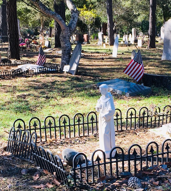 Saint Francis and an American object of worship. Photo by David Augsburger in Cambria, CA