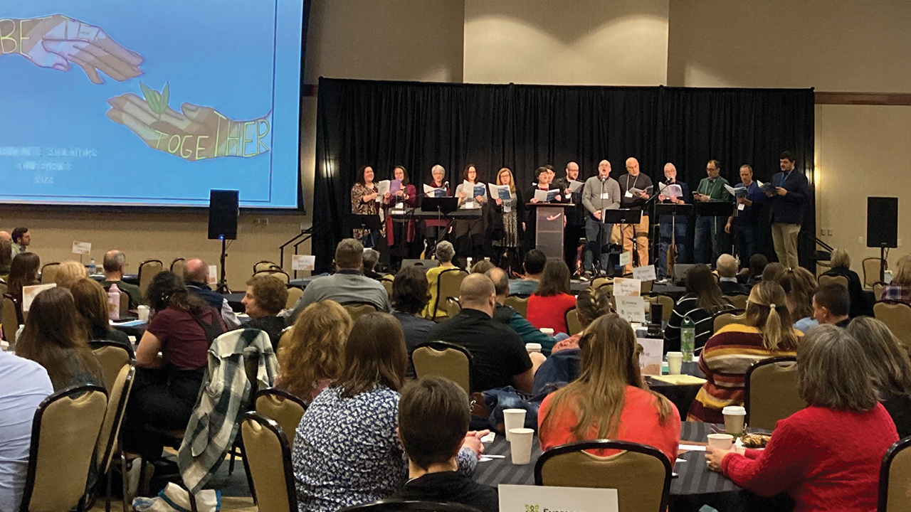 Choral leaders sing together at the Mennonite Educators Conference. — Jenn Esbenshade