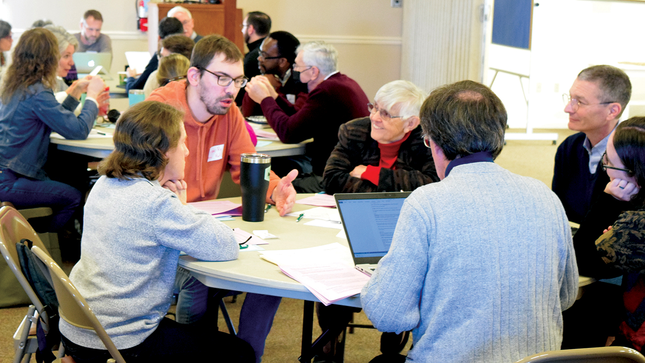 Sean Reece, delegate of New Holland Mennonite Church, shares with his table group. — Atlantic Coast Conference