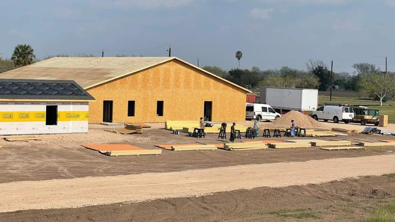Mennonite Disaster Service volunteers work Jan. 18 on an expansion of facilities at La Posada Providencia, a shelter for asylum seekers in San Benito, Texas. — Mennonite Disaster Service