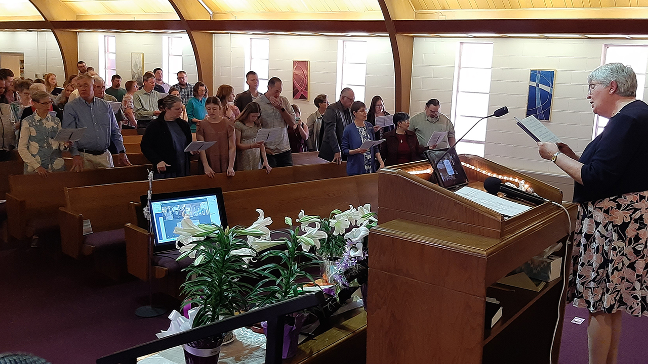 Trinity Mennonite Church Pastor Norma Duerksen leads the Easter Sunday service April 9. — Laurie Oswald Robinson