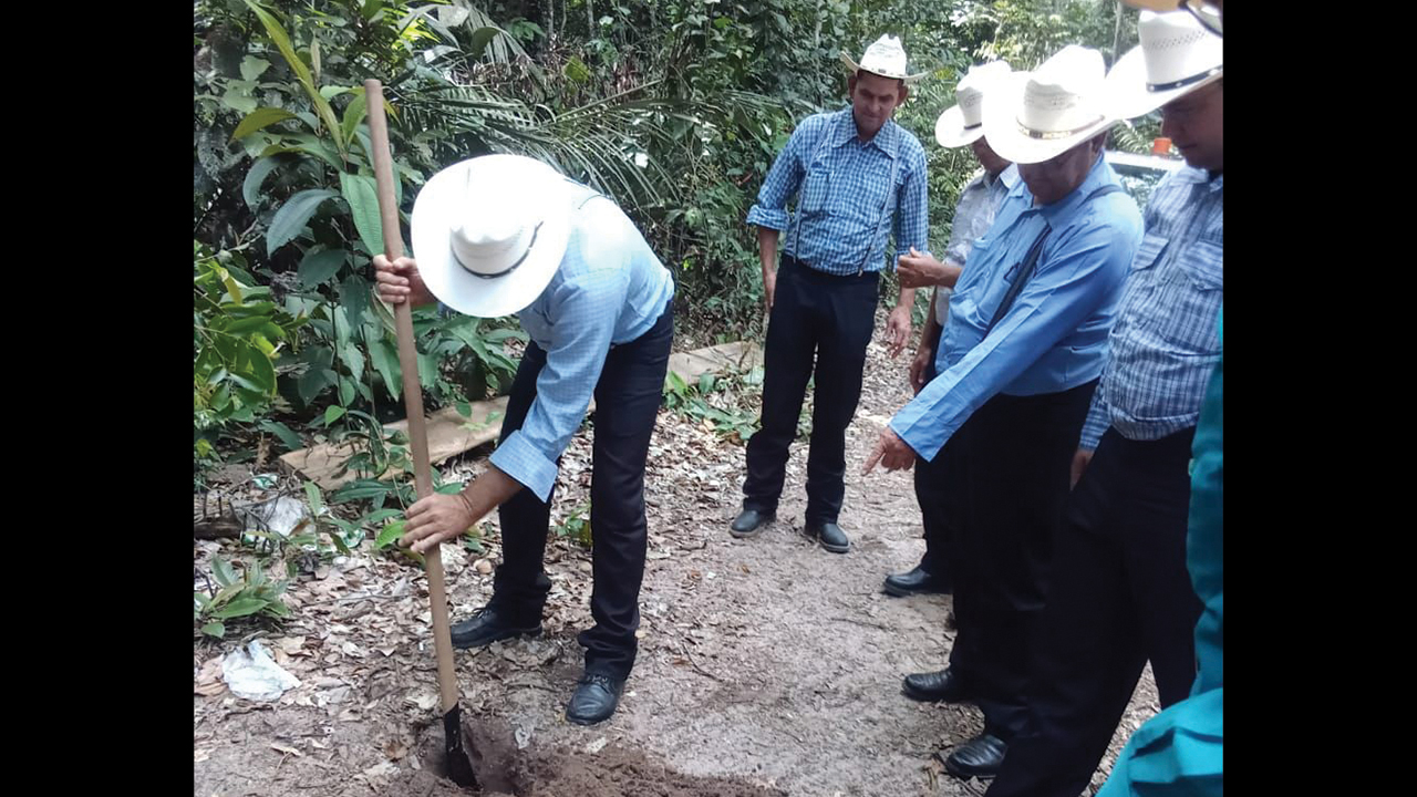 A group from Shipyard, Belize, inspects soil in Suriname in February. — Adrian Barbero