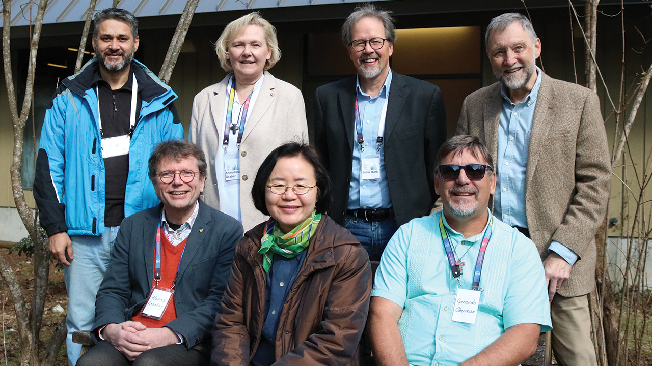 Representatives of Mennonite World Conference and the World Communion of Reformed Churches gathered in March in British Columbia. In front are Hanns Lessing of Germany, Meehyun Chung of South Korea and Gerardo Obermann of Argentina. In back are Rafael Zaracho of Paraguay, Anne-Cathy Graber of France, John D. Roth of the United States and Thomas R. Yoder Neufeld of Canada. — Karla Braun/MWC