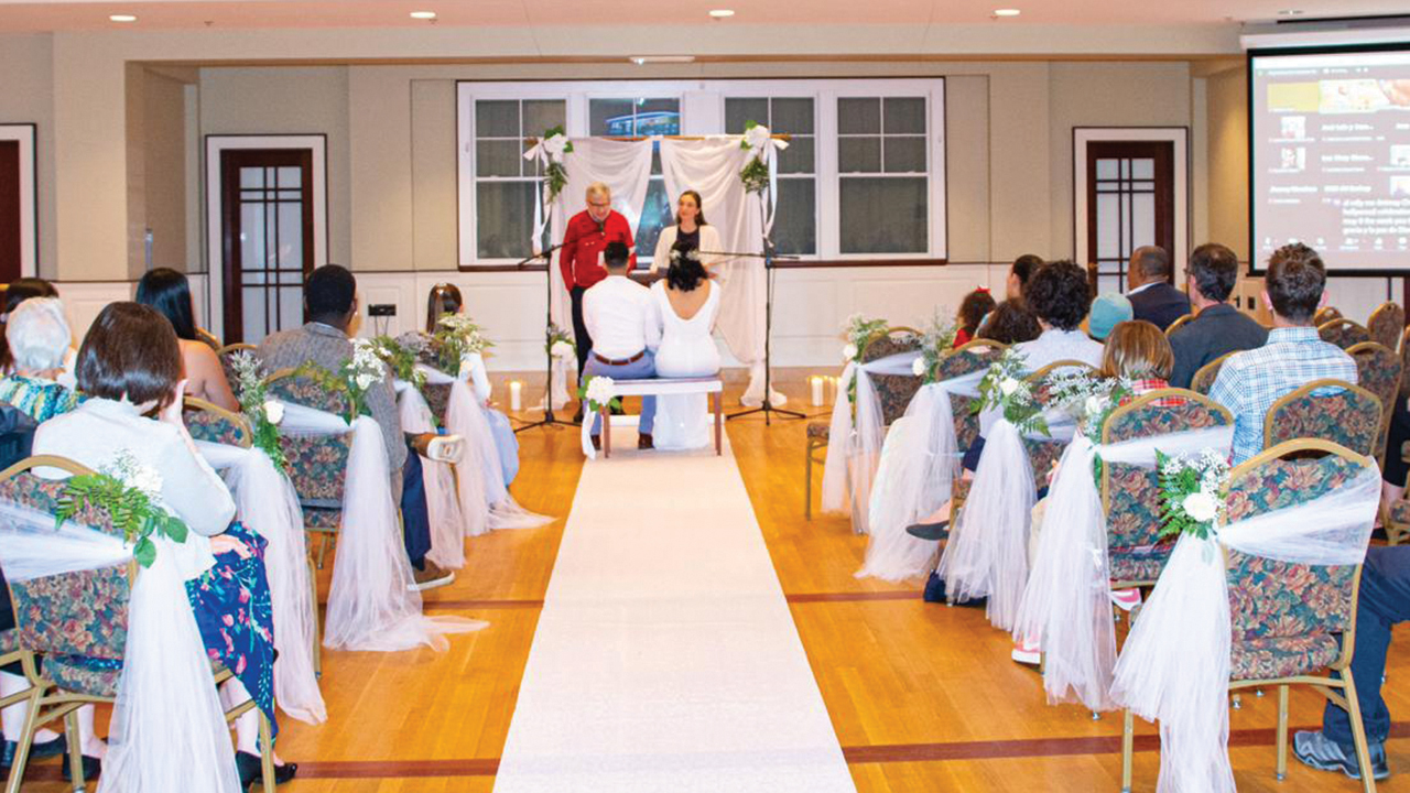 Pastor Melissa Florer-Bixler officiated the wedding of Juan Miguel Cruz and Laura Mendoza at Raleigh Mennonite Church in April. — Laura Mendoza and Juan Miguel Cruz