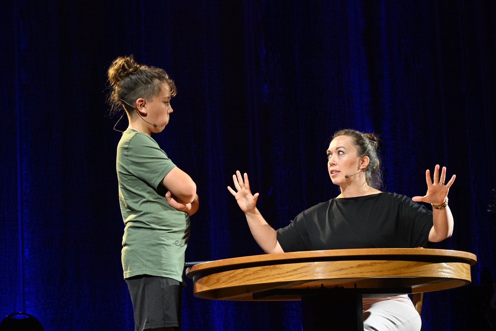 Talashia Keim Yoder and son Zeph portraying a mother and son talking
about how to read the Bible as “not just a story but our story,” one that forms and transforms
us in the image of God. - Mennonite Church USA