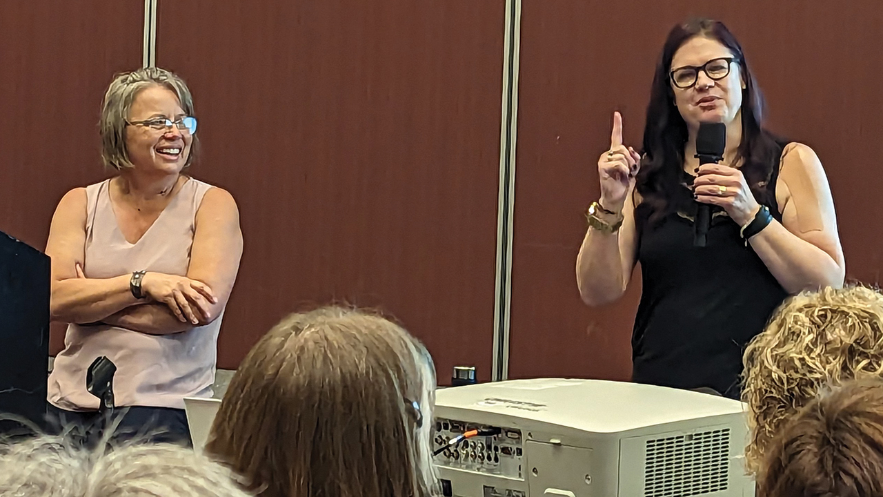 Michelle Hofer, right, and Jill Hofer speak about how to listen to someone sharing about trauma. — Tim Huber/Anabaptist World