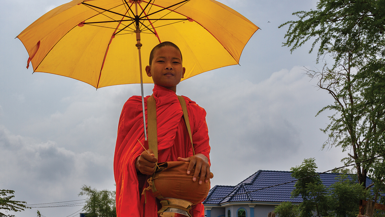 Seekers in Cambodia will learn the impact of Buddhism on the country through dialogue and visiting cultural sites. This photo was taken by Isaac Alderfer, a young-adult participant in MCC’s Serving and Learning Together program in 2022-23. In the photo, Ry Veasna, 17, a monk from the Snae Ben Pagoda in Mesang District, Cambodia, walks through Snae Ben to collect offerings of food and money from local people. — Isaac Alderfer/MCC