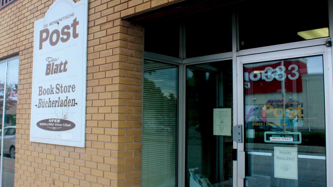The sign outside Die Mennonitische Post’s bookstore in Steinbach, Man. — Emily Loewen/MCC