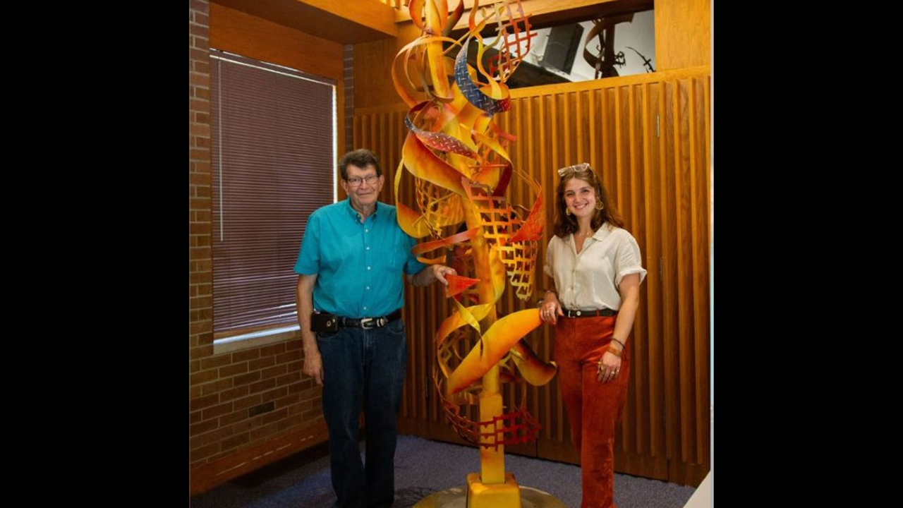 John Mishler and Emma Zuercher with “Forged Spirit.” — Julian Gonzalez/Goshen College
